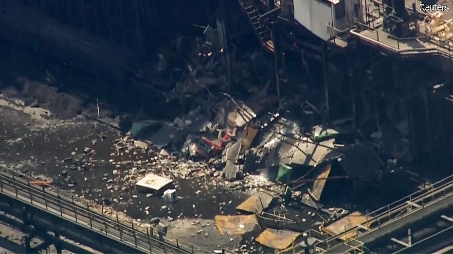 parts of facility destroyed with wreckage scattered everywhere