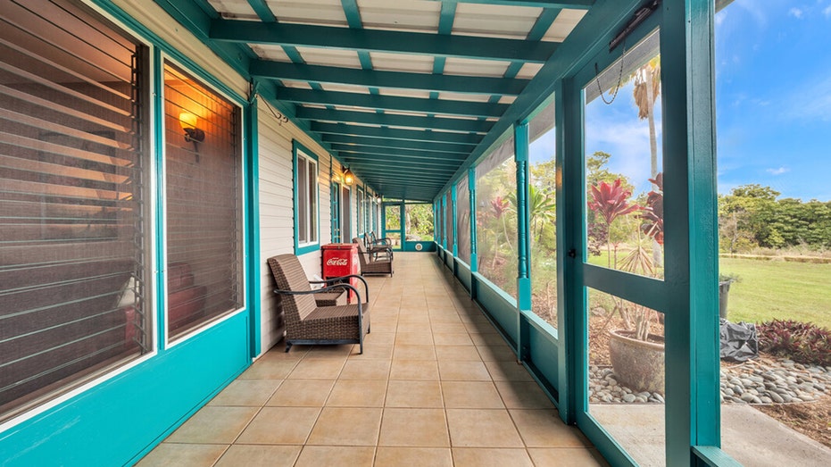 The lanai looks out onto the ocean and gardens.