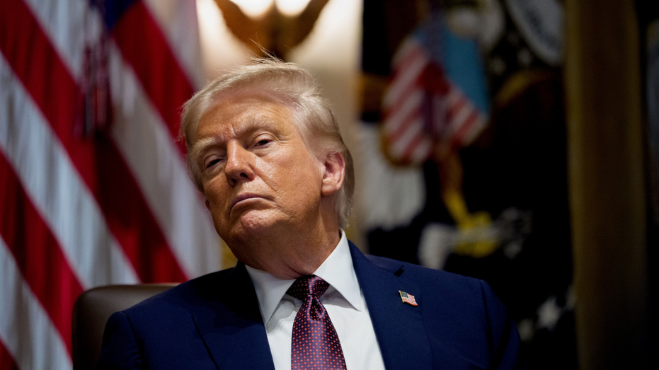 Trump listens during a Cabinet meeting