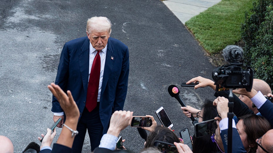 Trump talks to reporters outside White House