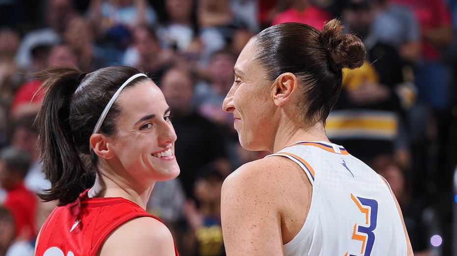 Diana Torrasi and Kitlene Clark during the WNBA game