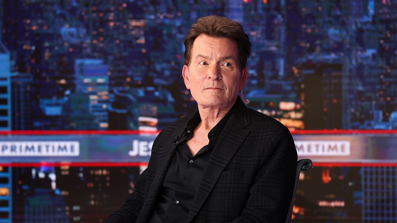 What are the years calling Charlie Sheen’s addica after ‘two and half of people’?
