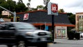 SAN RAFAEL, CALIFORNIA - APRIL 25: A car drives by a Jack in the Box restaurant on April 25, 2025 in San Rafael, California. California-based fast food chain Jack in the Box announced plans to close 150-200 underperforming stores after the company reported a 4.4% decline in same-store sales in the second quarter of 2025. (Photo by Justin Sullivan/Getty Images) - Fox News