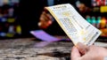 A person holds a Powerball lottery ticket they purchased at the Brew Market &amp; Cafe on Sept. 4, 2025, in Austin, Texas. - Fox News