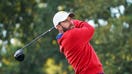 Team USA golfer Cameron Young hits his tee shot on the third hole during the Presidents Cup golf tournament at Quail Hollow Golf Club.  - Fox Business News