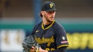 Paul Skenes of the Pittsburgh Pirates gets set to throw a warm up pitch in the first inning during a game against the Los Angeles Dodgers at PNC Park on Sept. 4, 2025 in Pittsburgh, Pennsylvania. - Fox Business News