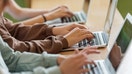 High school students use laptops during a classroom lesson. - Fox Business News