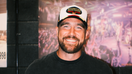 Travis Kelce, the Kansas City Chiefs star tight end, smiles at his foundation's third annual "Kelce Car Jam," sponsored by Raising Cane's. - Fox Business News