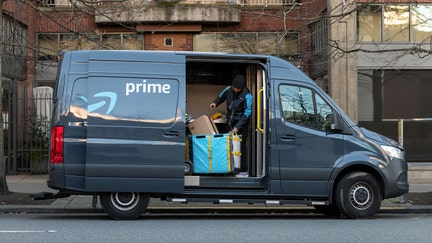 Amazon Prime Now Delivery van and driver downtown on 4th avenue late in the day. - Fox Business News