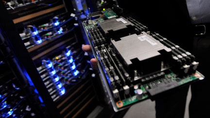 Tom Furlong, Vice President of Site Operations at Facebook, shows a server tray during a tour of the new Facebook Data Center on April 19, 2012 in Forest City, North Carolina.   - Fox Business News