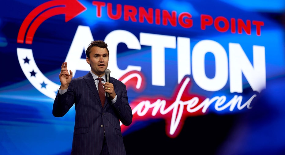 Charlie Kirk speaks at a TPUSA event