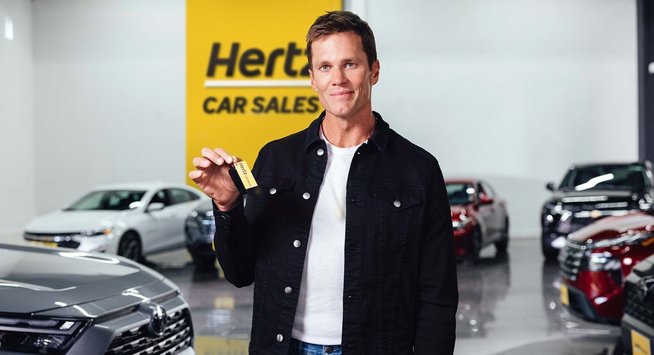 Tom Brady holds car keys in Hertz advertisement