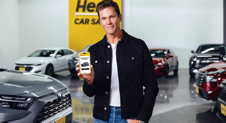 Tom Brady with Hertz Car Sales app