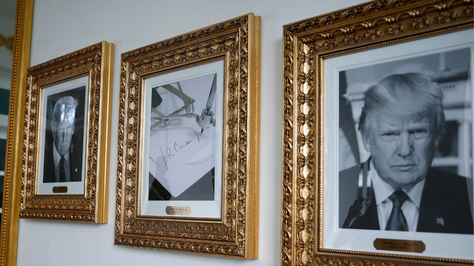 Framed portraits on the wall of the colonnade outside of the Oval Office at the White House