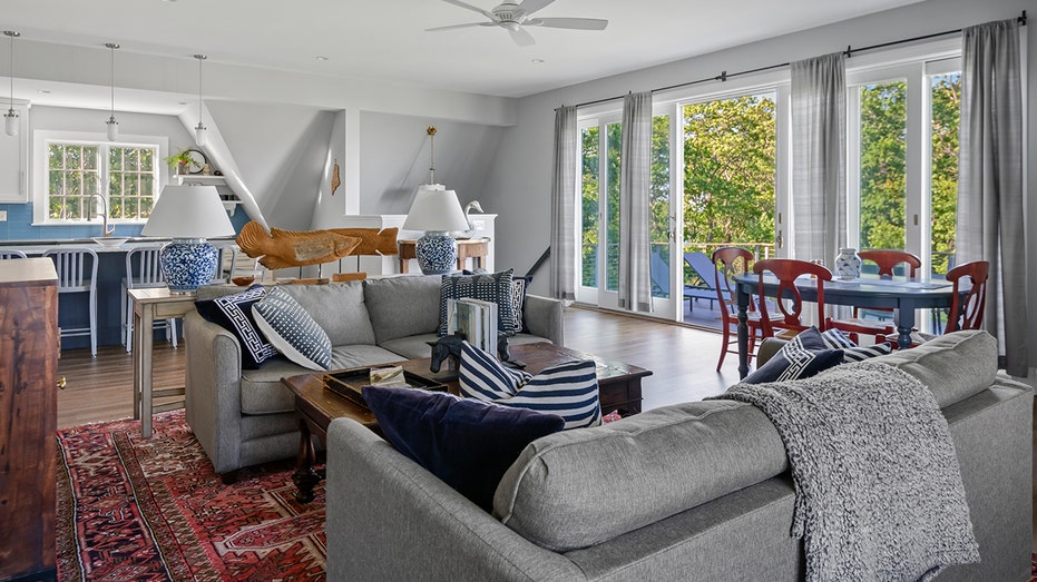 The guest house features its own living room and full kitchen.