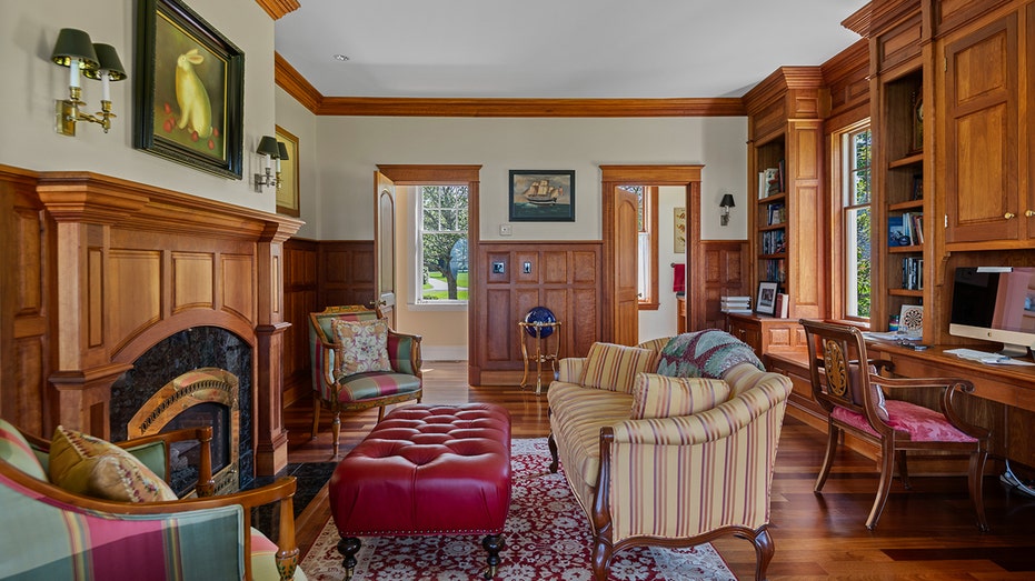 The home also boasts an office space with a fireplace and hardwood floors.