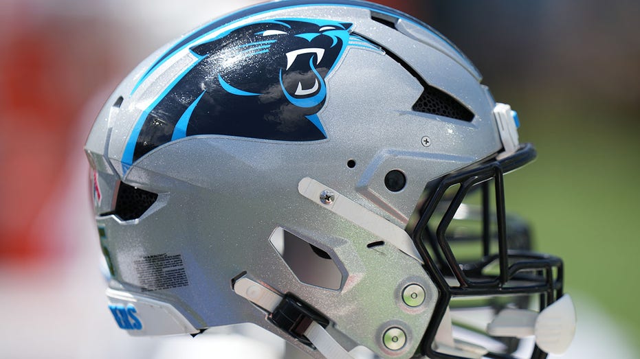 Carolina Panthers helmet is on the sidelines during a game.