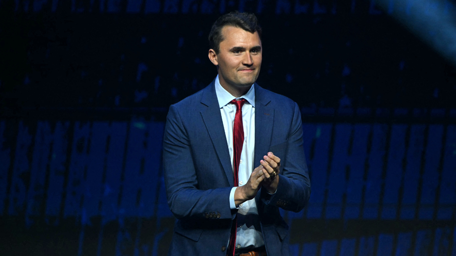 Charlie Kirk smiles and hit during the turning point of the Turning Point Acompaign Rally