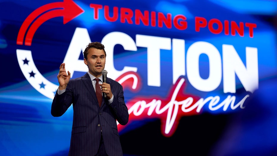 Charlie Kirk speaks at a TPUSA event