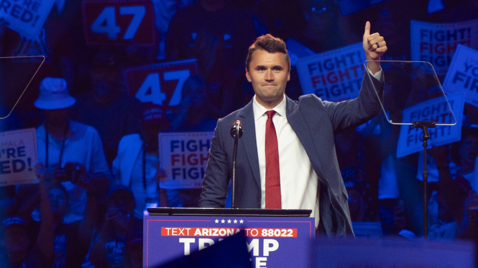 Charlie Kirk speaks during a campaign rally for Trump