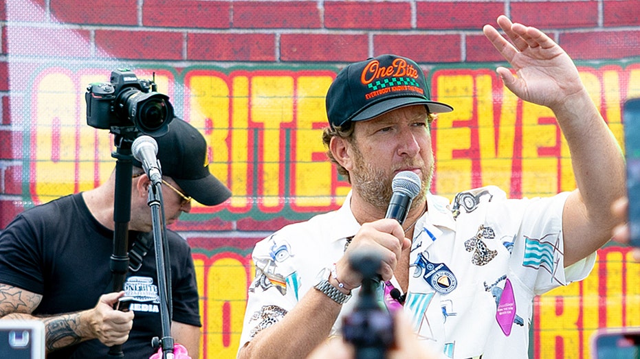 Dave Portnoy speaks to the crowd at his third annual pizza fest in New York City on Saturday.