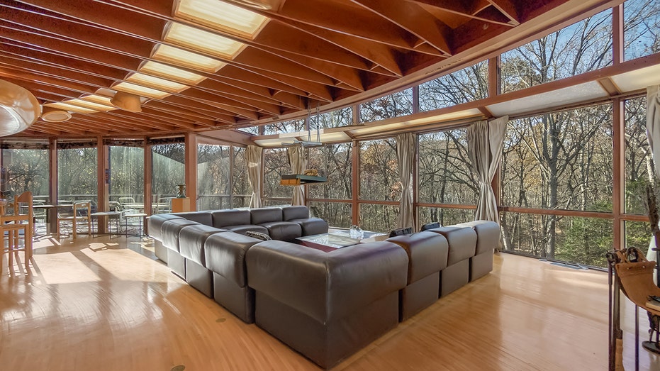 Home has lower windows including the views of the surrounding environment.