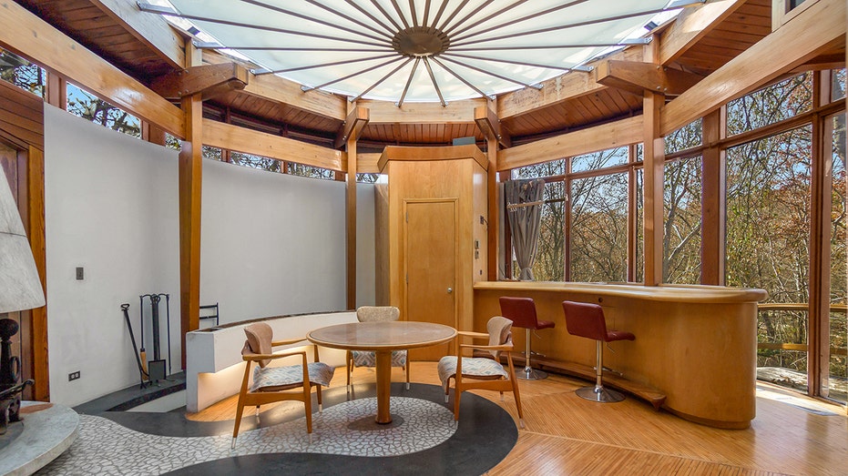 The office shows on the roof of a round furniture and wooden furniture.