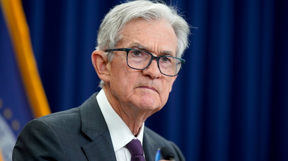 Fed chair Jerome Powell speaks to reporters