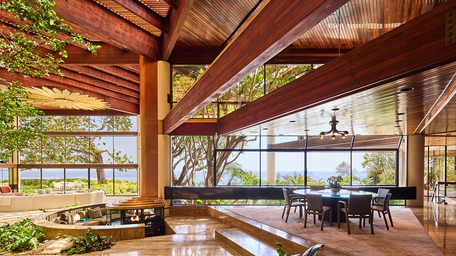 The home features an open floorplan with views of the ocean.