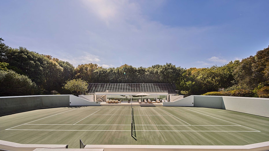 The property also features a regulation tennis court.
