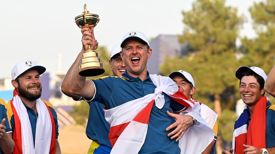 Justin Rose with Ryder Cup trophy