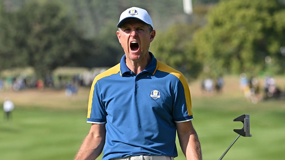 Justin Rose celebrates