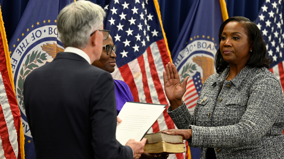 Federal Reserve Chairman Jerome Powell swears in Lisa Cook to the Fed Board.