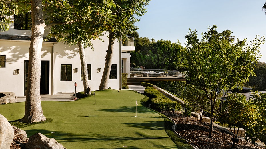 The grounds also feature a small putting green and a two-bedroom guest house.