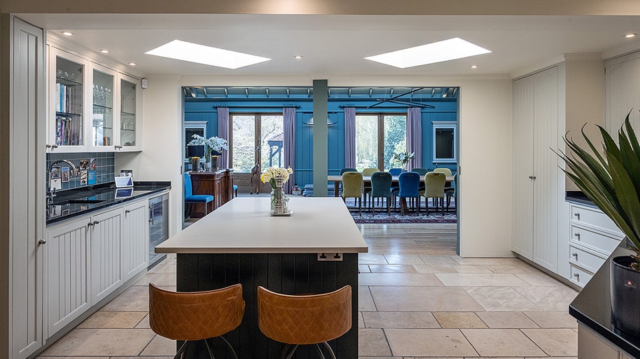 The kitchen includes the food island in the area.
