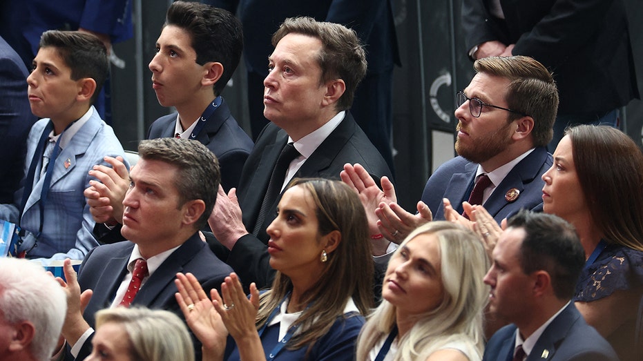 Tesla CEO Elon Musk attends the public memorial service for right-wing activist Charlie Kirk at State Farm Stadium in Glendale, Arizona, on September 21, 2025.