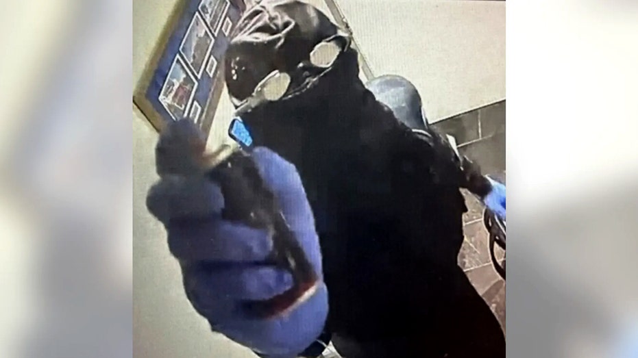 Popular restaurant at Disney shopping area robbed by suspect in scuba gear
