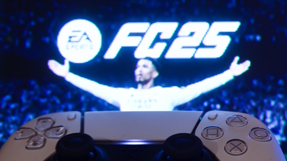 EA Sports game screen behind PlayStation controller