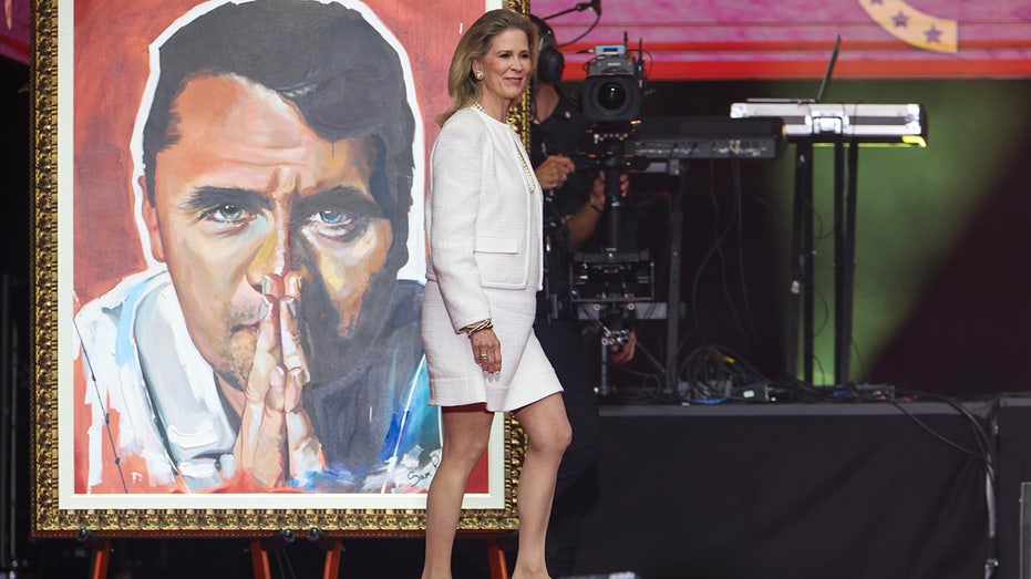 Philanthropist Rebecca Dunn speaks during the memorial service for political activist Charlie Kirk at State Farm Stadium on September 21, 2025 in Glendale, Arizona.