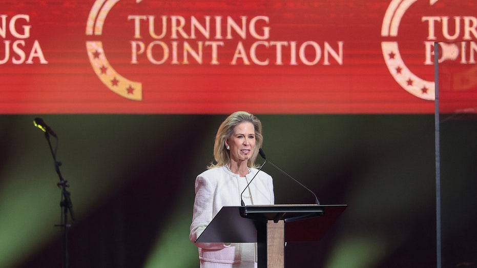 Philanthropist Rebecca Dunn speaks during the memorial service for political activist Charlie Kirk at State Farm Stadium on September 21, 2025 in Glendale, Arizona.