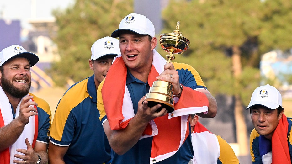 Sepp Straka with Ryder Cup trophy