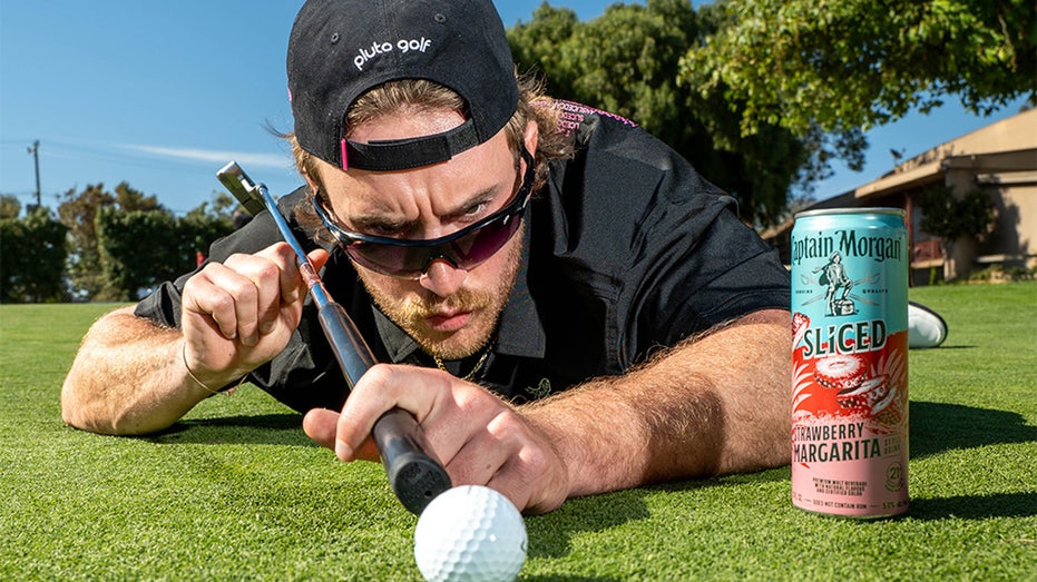 West Wilson putts ball