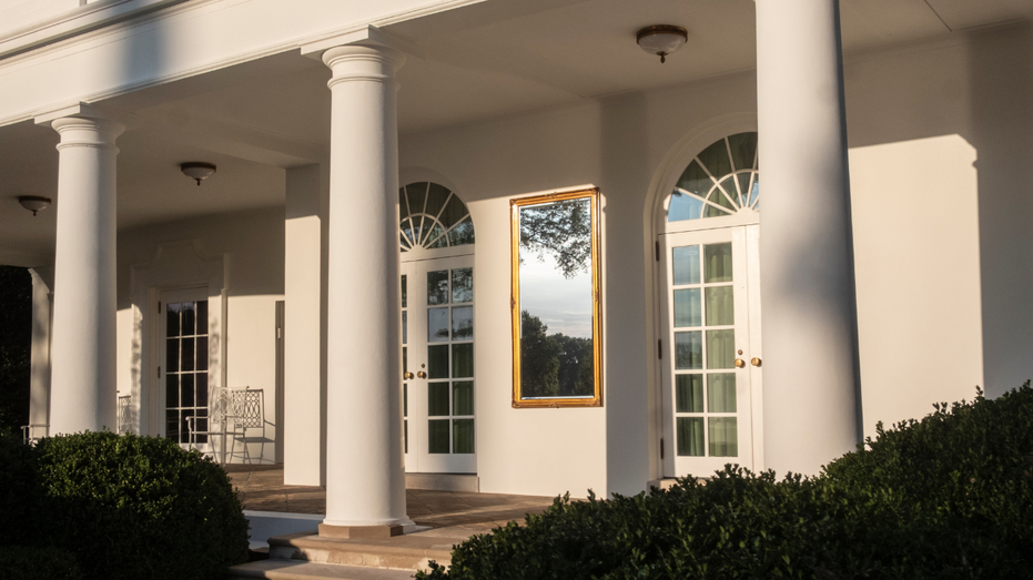 A newly installed large mirror adorns a wall outside of the Oval Office at the White House on September 28, 2025 in Washington.