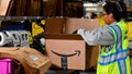 A worker packages products during a media tour of the Amazon.com Inc. DAB2 fulfillment center in Daytona Beach, Florida, US, on Tuesday, Sept. 23, 2025. The DAB2 fulfillment center is Amazon's seventh robotics fulfillment center in Florida. - Fox News