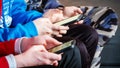 A group of teens seen using their smart phones. - Fox News