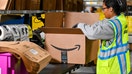 A worker packages products during a media tour of the Amazon.com Inc. DAB2 fulfillment center in Daytona Beach, Florida, on Tuesday, Sept. 23, 2025. - Fox Business News