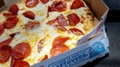 MIAMI, FLORIDA - JULY 21:  In this photo illustration, a Domino's pizza sits in a take-out box on July 21, 2025 in Miami, Florida. Domino’s reported second-quarter U.S. same-store sales growth of 3.4%, which is more than the estimated 2% increase.  (Photo illustration by Joe Raedle/Getty Images) - Fox Business News