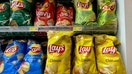 SAN ANSELMO, CALIFORNIA - JANUARY 29: Bags of Lay's Classic potato chips are displayed at a grocery store on January 29, 2025 in San Anselmo, California. The F.D.A. has upgraded a recall of over 6,000 bags of Frito-Lay Lay’s Classic Potato Chips to a Class I recall, the agency's highest level of severity, to warn consumers of potentially serious or even deadly consequences from consuming the product which could contain undeclared milk. (Photo by Justin Sullivan/Getty Images) - Fox Business News