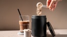 Protein shake and chocolate protein powder in a scoop, food supplement - Fox Business News