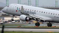 Flight makes emergency landing after cabin crew was 'knocking on the cockpit door' over communications issue